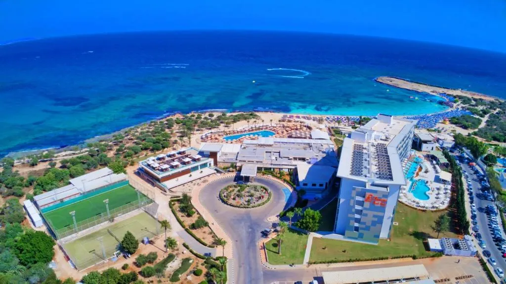 Asterias Beach Hotel aerial view with beach and pools, Ayia Napa