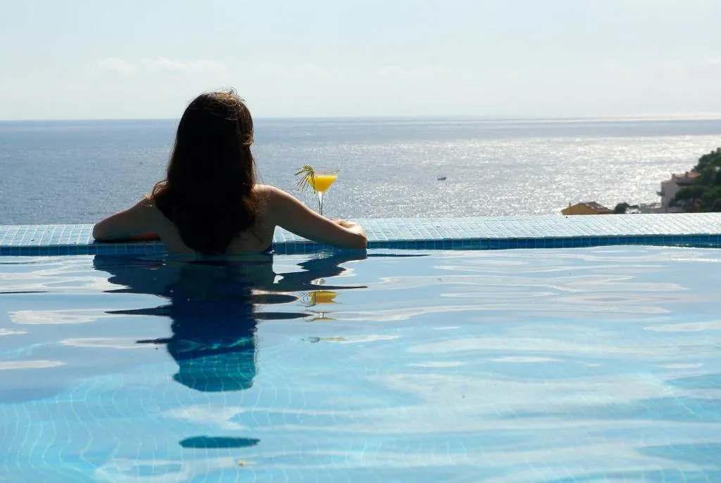 BlauMar Llafranc outdoor pool with sea view over Costa Brava cove