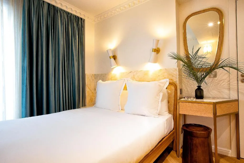 Rose Bourbon hotel facade on Rue de l'Église, Paris 15th