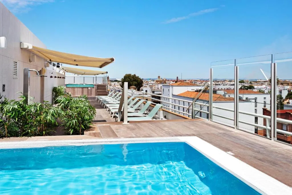 Rooftop pool and terrace at Catalonia Santa Justa, Seville