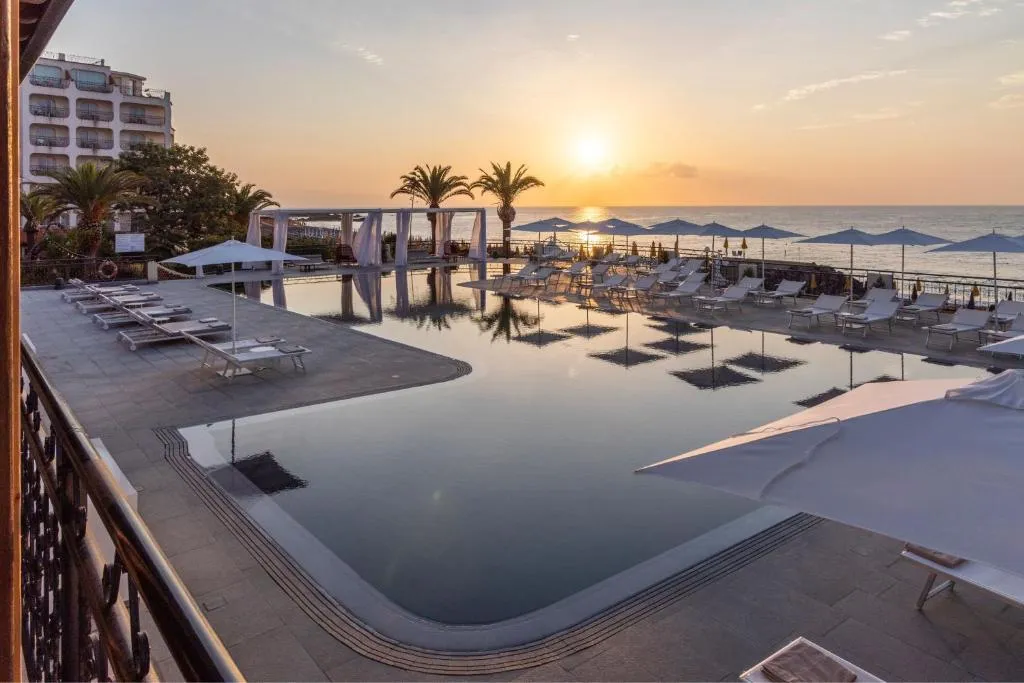 Delta Hotels Giardini Naxos exterior and infinity pool overlooking the sea